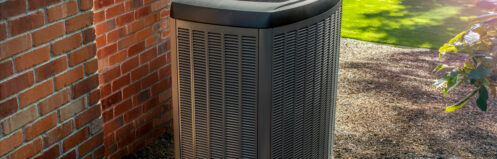 An AC condenser in a Coachella Valley back yard.