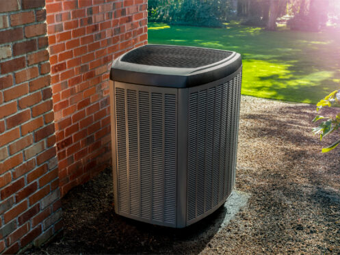 An AC condenser in a Coachella Valley back yard.