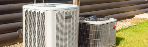 Air conditioning and heat pump outside a home