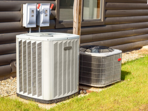 Air conditioning and heat pump outside a home