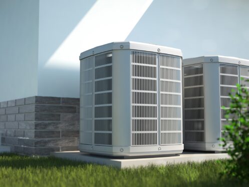 energy efficient air conditioners installed outside of ahome
